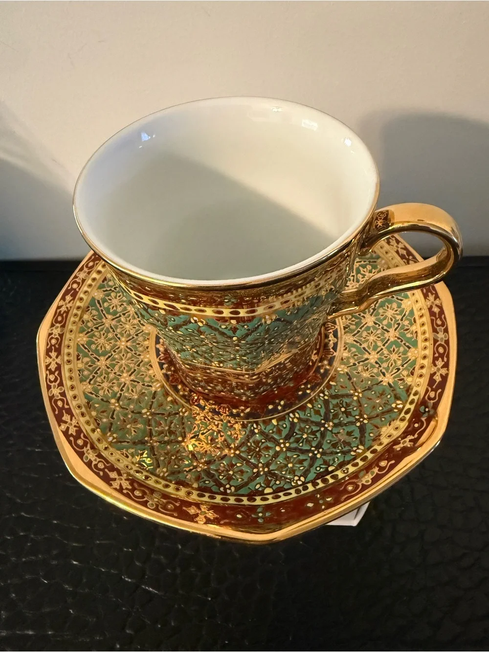 PIPATANA BENJARONG Green red and Gold Porcelain Teacup with Saucer.
